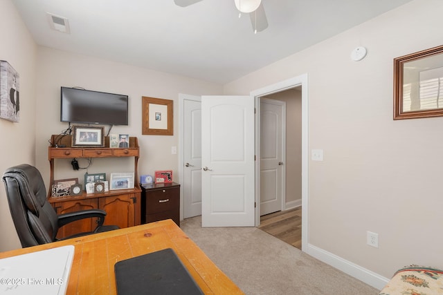 139 Sound Point Dr, Harkers Island, NC 28531 - office featuring light colored carpet, a ceiling fan, and baseboards