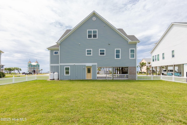139 Sound Point Dr, Harkers Island, NC 28531 - rear view of property featuring board and batten siding