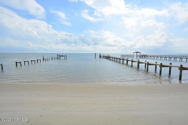 139 Sound Point Dr, Harkers Island, NC 28531 - dock area featuring view of water and beach