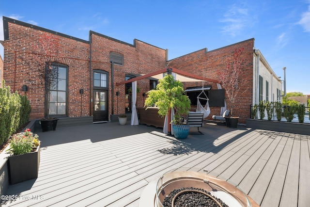 221 Craven St, New Bern, NC 28560 - wooden terrace with a fire pit