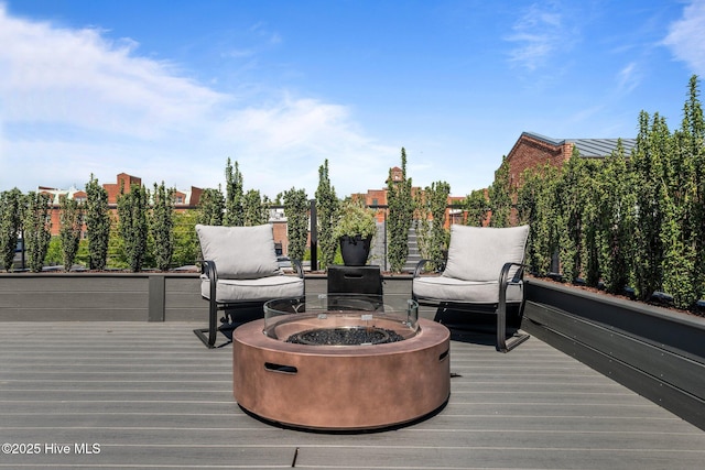 221 Craven St, New Bern, NC 28560 - wooden deck with a fire pit