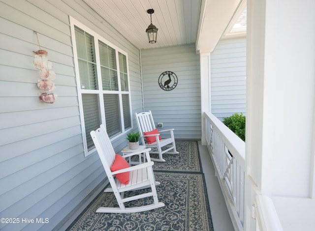6959 Gracieuse Ln SW, Ocean Isle Beach, NC 28469 - balcony with covered porch