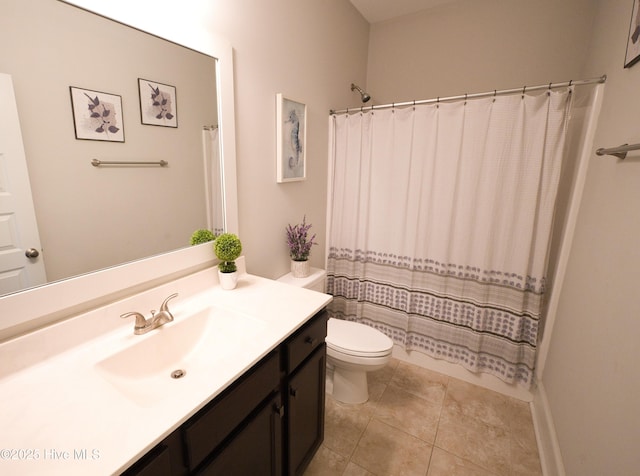 6959 Gracieuse Ln SW, Ocean Isle Beach, NC 28469 - bathroom with toilet, vanity, and tile patterned flooring