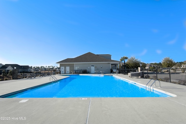 6959 Gracieuse Ln SW, Ocean Isle Beach, NC 28469 - community pool with fence and a patio