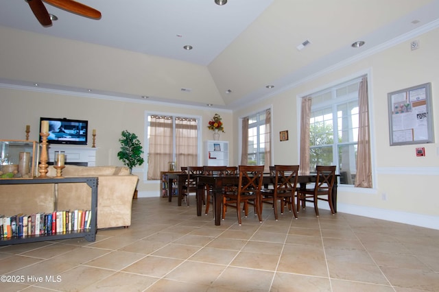 6959 Gracieuse Ln SW, Ocean Isle Beach, NC 28469 - dining space with light tile patterned floors, ornamental molding, baseboards, and ceiling fan