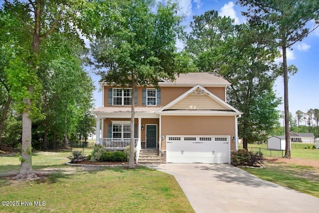 view of front of property featuring a front lawn, a porch, driveway, and fence