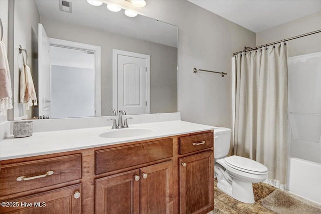 full bathroom featuring toilet, vanity, visible vents, and shower / bath combination with curtain