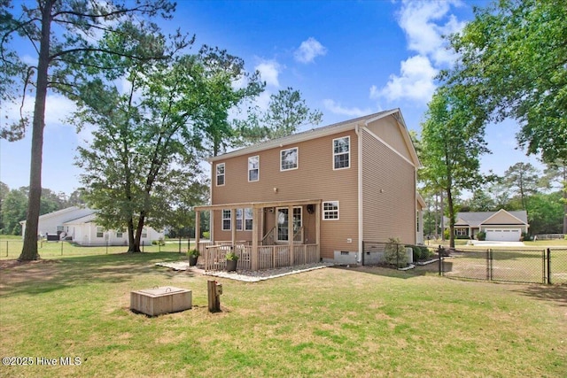back of property featuring french doors, a yard, crawl space, and fence private yard