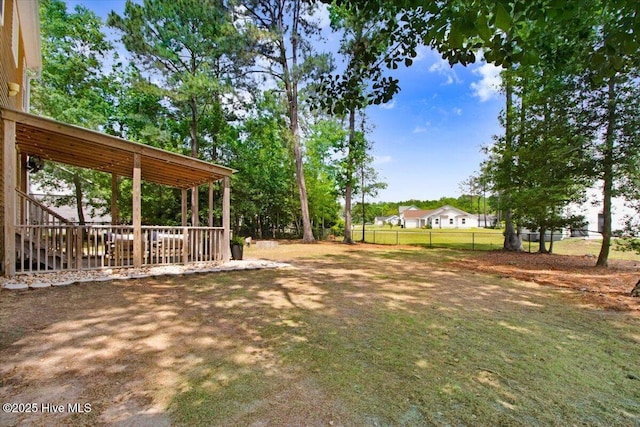 view of yard featuring fence