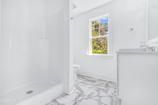 full bathroom featuring marble look tiles, a shower, toilet, baseboards, and vanity