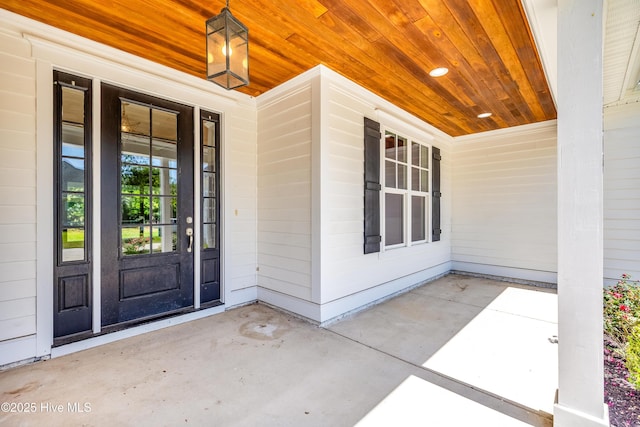 doorway to property with a porch