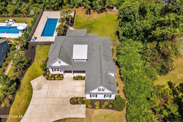 view from above of property with a pool area