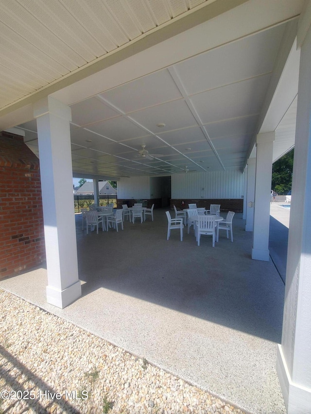 view of patio with an outdoor living space and outdoor dining area