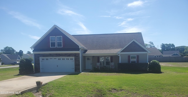 view of front of home featuring concrete driveway, a garage, and stone siding