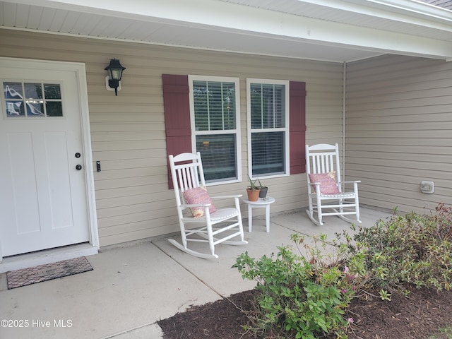 19 Darel St, Rocky Point, NC 28457 - doorway to property with a porch