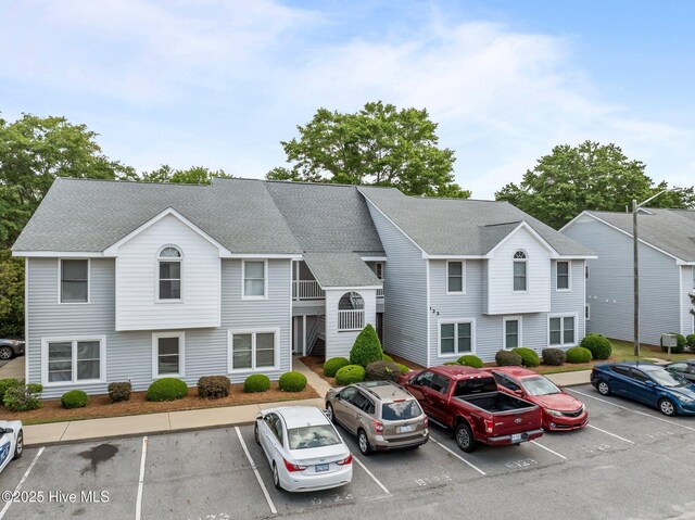 123 W Victoria Ct Unit F, Greenville, NC 27834 - view of building exterior featuring uncovered parking
