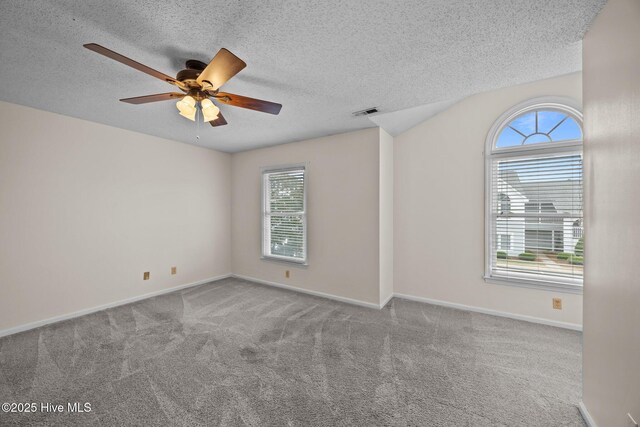 123 W Victoria Ct Unit F, Greenville, NC 27834 - empty room featuring a ceiling fan, carpet floors, a textured ceiling, and baseboards
