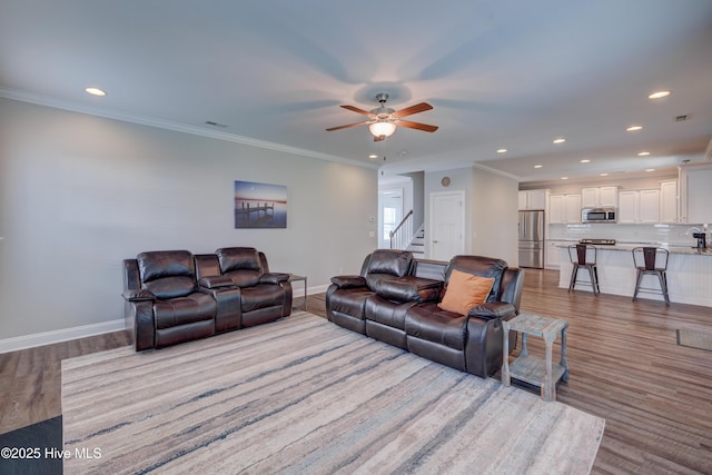 519 W Craftsman Way, Hampstead, NC 28443 - living area featuring recessed lighting, a ceiling fan, stairway, baseboards, and wood finished floors