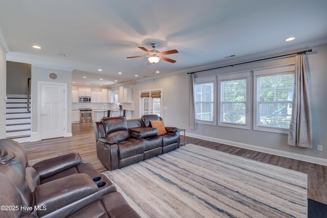519 W Craftsman Way, Hampstead, NC 28443 - living room with ornamental molding, ceiling fan, wood finished floors, recessed lighting, and baseboards