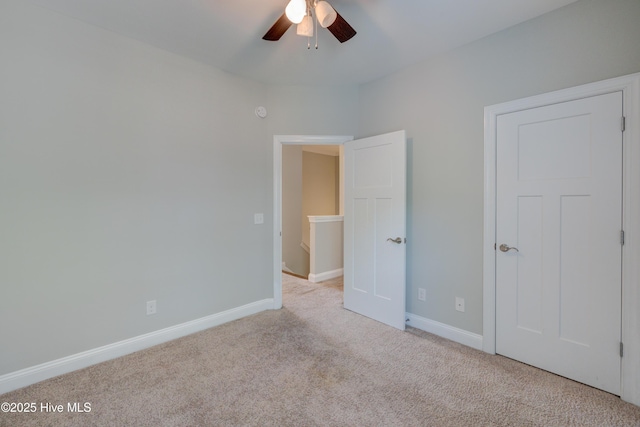 519 W Craftsman Way, Hampstead, NC 28443 - unfurnished bedroom with carpet floors, baseboards, and ceiling fan