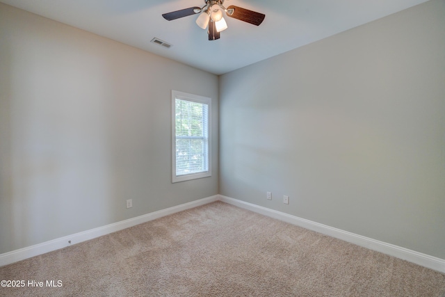 519 W Craftsman Way, Hampstead, NC 28443 - empty room featuring baseboards, light colored carpet, and a ceiling fan