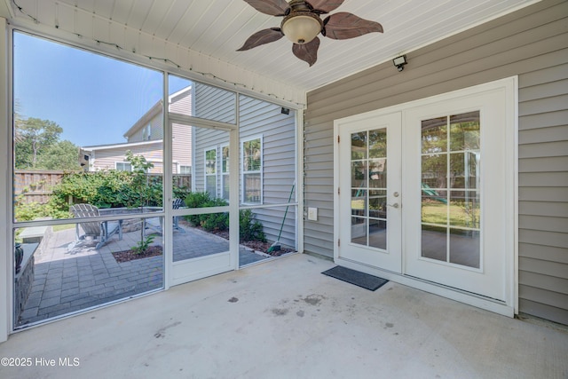 519 W Craftsman Way, Hampstead, NC 28443 - unfurnished sunroom featuring a ceiling fan, french doors, and plenty of natural light