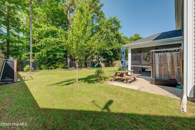 519 W Craftsman Way, Hampstead, NC 28443 - view of yard with a playground and a patio