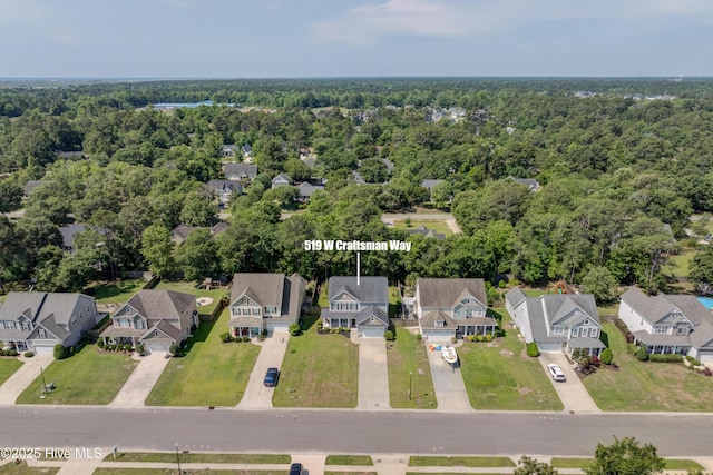 519 W Craftsman Way, Hampstead, NC 28443 - aerial overview of property's location with nearby suburban area and a heavily wooded area