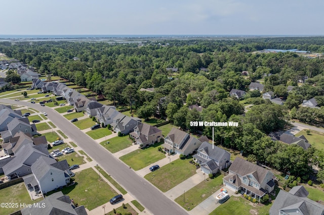 519 W Craftsman Way, Hampstead, NC 28443 - aerial perspective of suburban area featuring a heavily wooded area