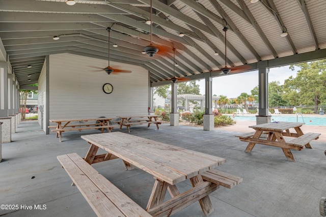 519 W Craftsman Way, Hampstead, NC 28443 - view of patio with a community pool, ceiling fan, and outdoor dining area