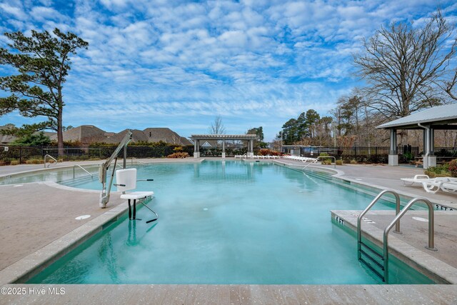 519 W Craftsman Way, Hampstead, NC 28443 - community pool featuring a pergola, a gazebo, and a patio area