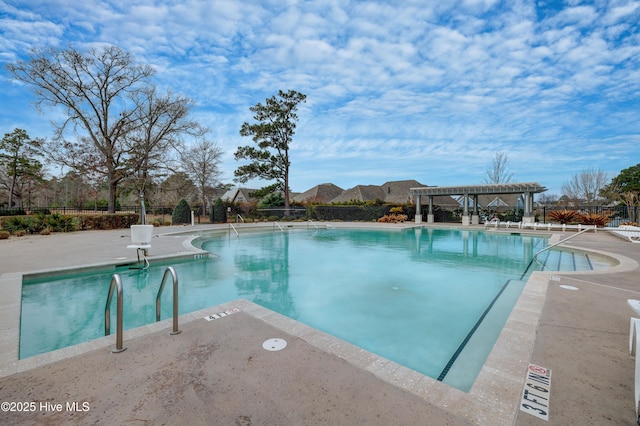 519 W Craftsman Way, Hampstead, NC 28443 - community pool with a pergola and a patio area