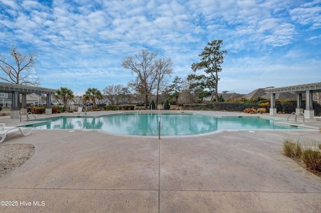519 W Craftsman Way, Hampstead, NC 28443 - community pool with a pergola and a patio area