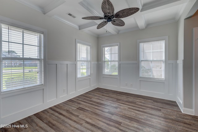 519 W Craftsman Way, Hampstead, NC 28443 - unfurnished room featuring coffered ceiling, a decorative wall, dark wood-style floors, beamed ceiling, and wainscoting