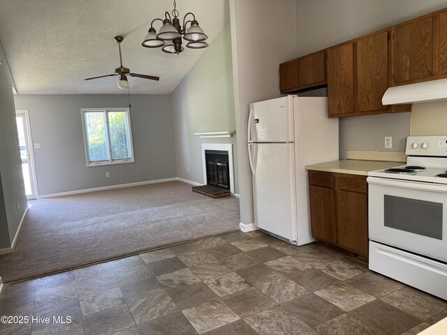 kitchen with white appliances, dark carpet, under cabinet range hood, ceiling fan, and baseboards