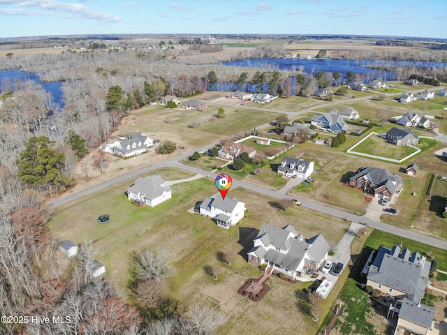 aerial view with a water view and a residential view
