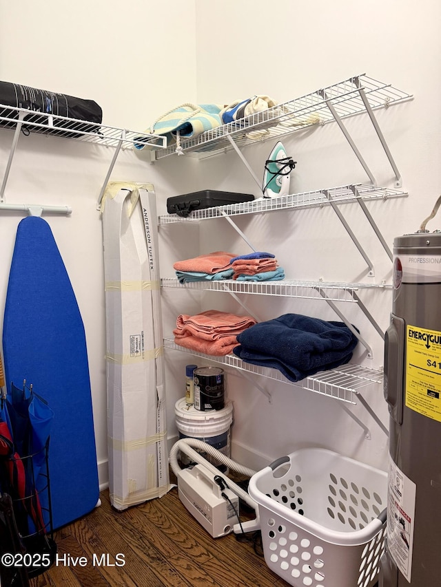 storage area featuring water heater