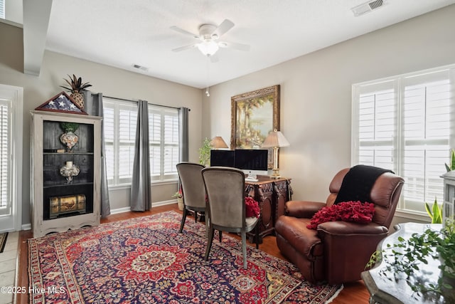 417 Pennington Loop, Myrtle Beach, SC 29588 - office space with ceiling fan, a tile fireplace, and wood finished floors