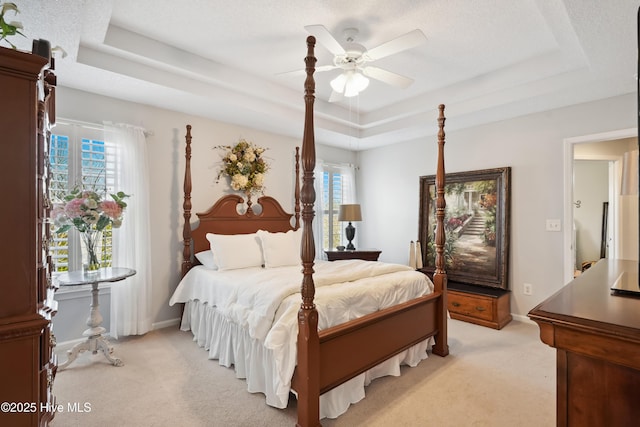 417 Pennington Loop, Myrtle Beach, SC 29588 - bedroom with a raised ceiling, multiple windows, and light colored carpet