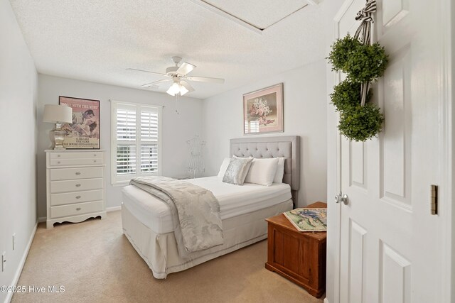 417 Pennington Loop, Myrtle Beach, SC 29588 - bedroom with light colored carpet, a ceiling fan, a textured ceiling, and baseboards