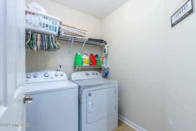 laundry room featuring washing machine and clothes dryer