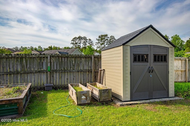 view of shed with a vegetable garden