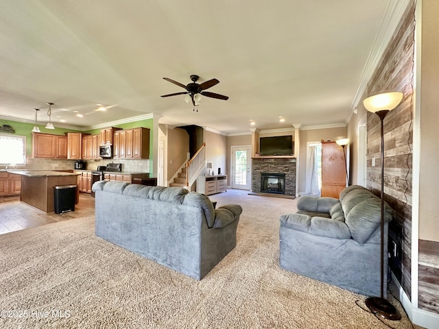 101 Pete Bunch Ln, Hobbsville, NC 27946 - living room with a stone fireplace, light carpet, stairs, crown molding, and recessed lighting