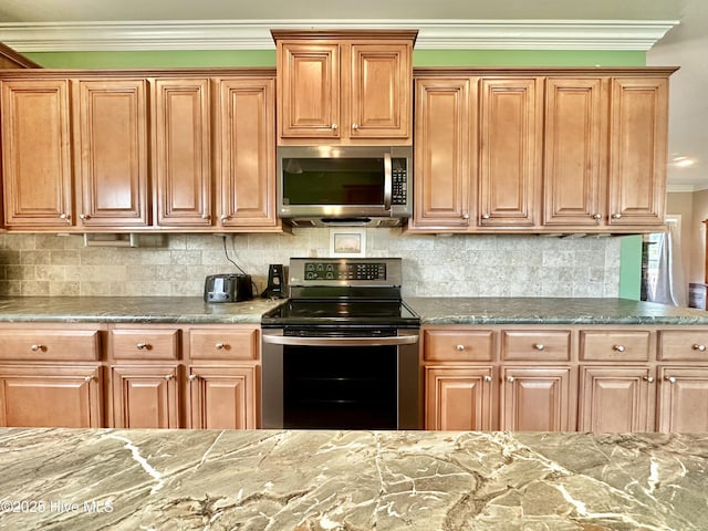 101 Pete Bunch Ln, Hobbsville, NC 27946 - kitchen featuring appliances with stainless steel finishes, ornamental molding, stone countertops, and tasteful backsplash