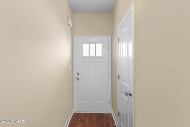323 Frisco Way, Holly Ridge, NC 28445 - entryway with baseboards and dark wood-style flooring