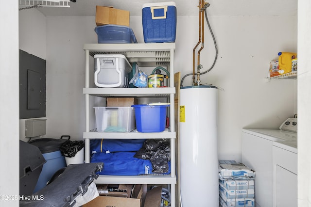 interior space featuring water heater and washing machine and dryer