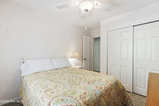 bedroom featuring a closet, baseboards, a ceiling fan, and carpet floors
