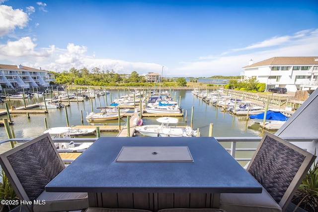 dock with view of marina and a water view