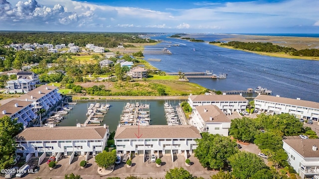 aerial view of a nearby body of water and a marina