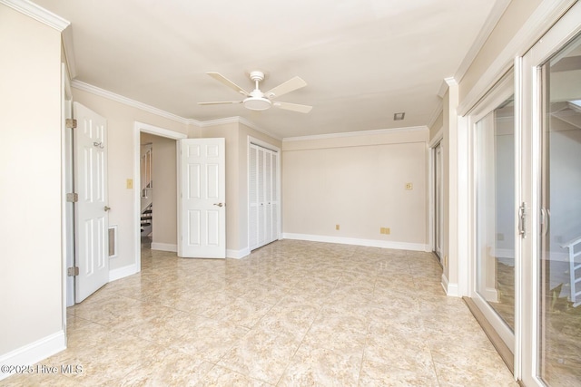 unfurnished bedroom featuring two closets, ornamental molding, ceiling fan, light tile patterned floors, and baseboards